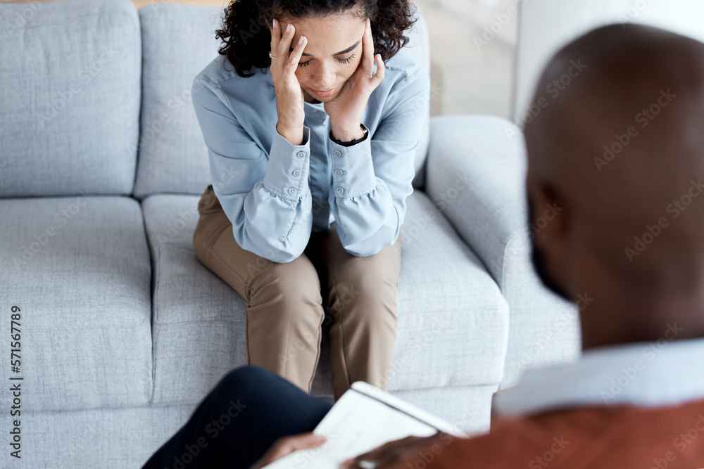 Counselling, therapy and depression of black woman with mental health problem on psychologist couch. Patient person talking to therapist man about psychology, anxiety and trauma or stress for help