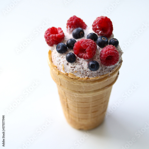 ice cream with raspberries and blueberries