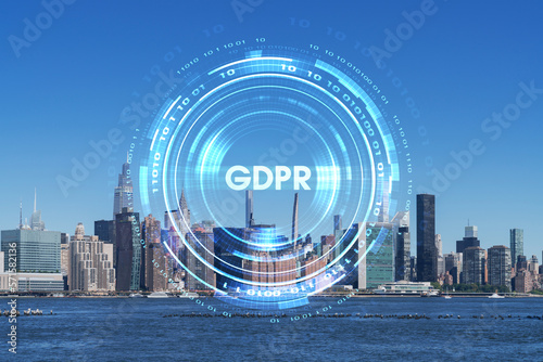 New York City skyline, United Nation headquarters over the East River, Manhattan, Midtown at day time, NYC, USA. GDPR hologram, concept of data protection, regulation and privacy for all individuals