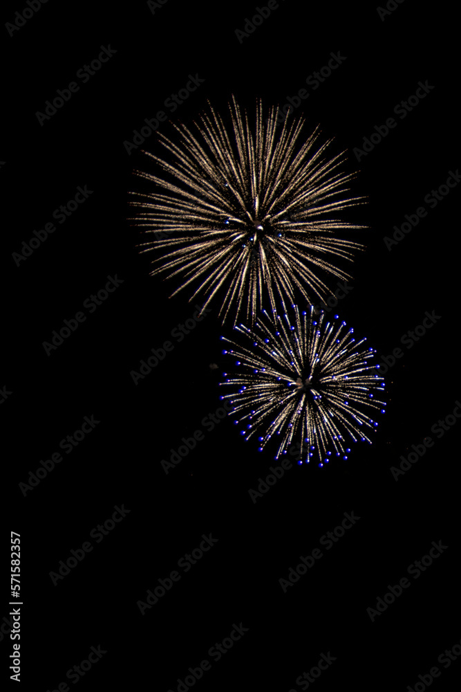 Beautiful abstract pattern with salute fireworks on dark background. Beautiful abstract pattern with salute fireworks on dark background.