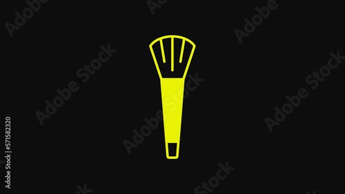 Yellow Makeup brush icon isolated on black background. 4K Video motion graphic animation