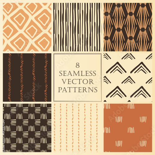 Set of seamless vector patterns with tribal theme and warm color palette.