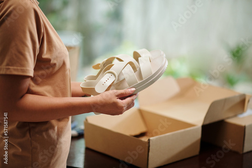 Woman Having Shoes Delivered photo