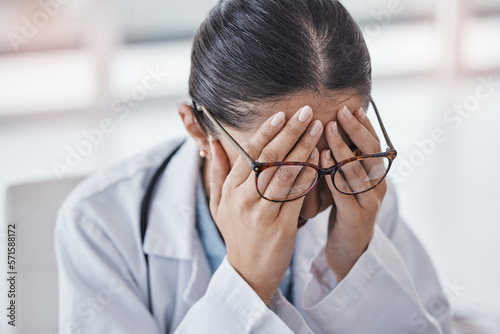 Burnout, stress or doctor woman with headache in office from depression, mental health or anxiety medical review. Tired, pain or sad nurse frustrated, angry or depressed from medicine report mistake