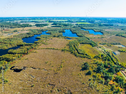 Aerial view of peat bog with lakes and forest in national park De Groote Peel, Limburg, Netherlands.