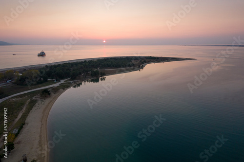 Aerial view of Ammoglossa beach, Keramoti, Greece at Sunset. photo