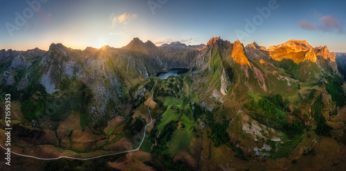 Panoramic aerial view of a mountain range landscape at sunset along Valle lake, Somiedo, Asturias, Spain.