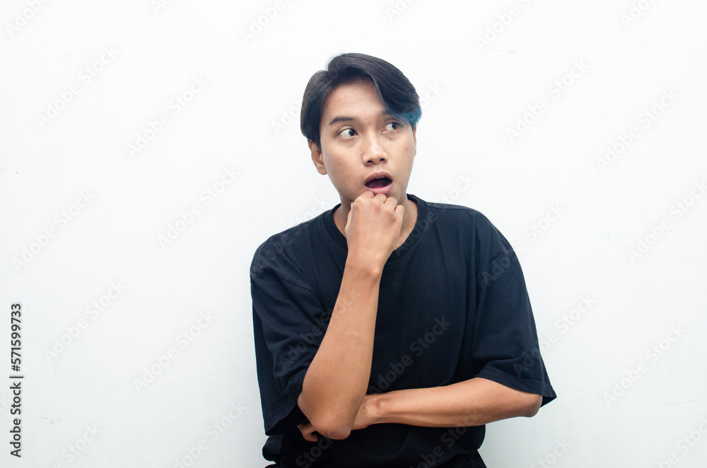 wow shocked expression of young asian man in peek a boo hair. wow shocked expression of young asian man in peek a boo hair.
