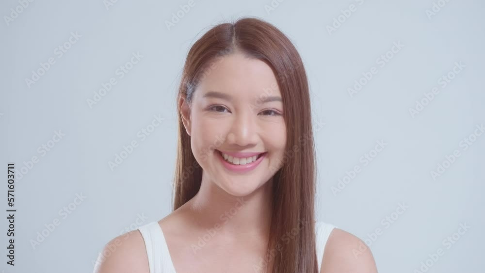 Portrait of beautiful asian woman over white background studio, skin care and beauty concept