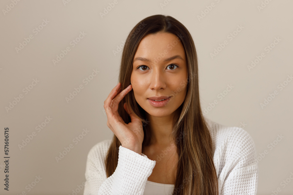 Young multiracial 20s woman portrait dressed in white bathrobe Young multiracial 20s woman portrait dressed in white bathrobe