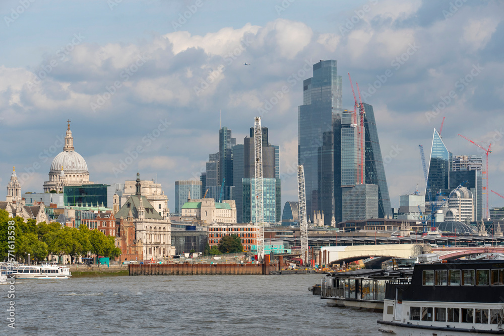 High rise buildings in London with St. Paul's Cathedral across the River Thames