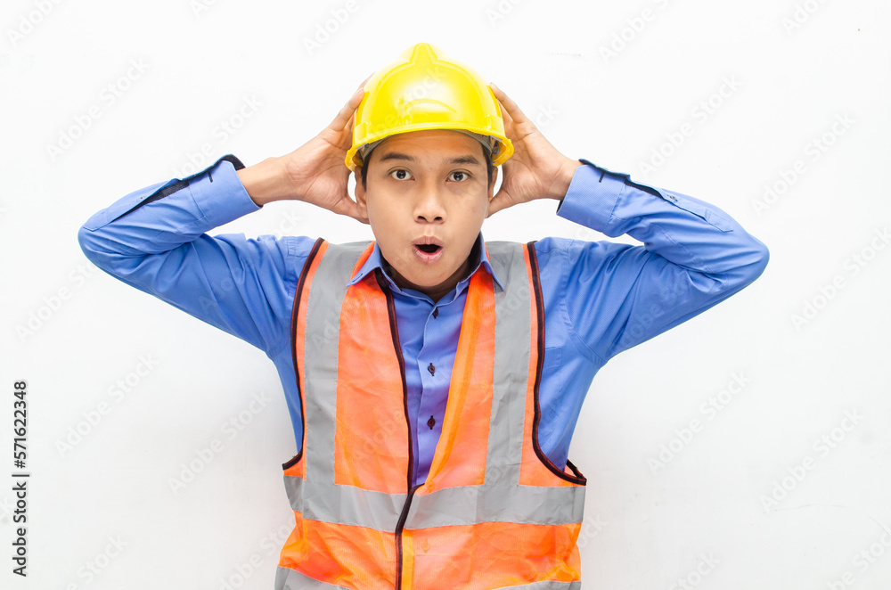 overjoyed asian male construction worker opening mouth shocked and surprised. construction worker with wow expression. overjoyed asian male construction worker opening mouth shocked and surprised. construction worker with wow expression.