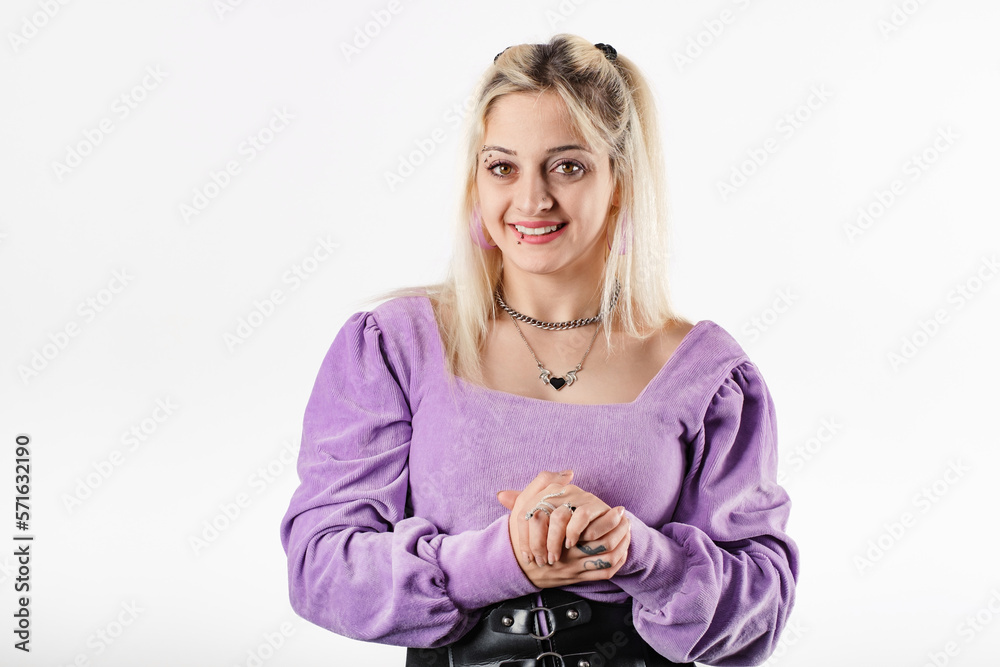 Young caucasian woman wearing blouse standing isolated over white background smiling and loving, holding hands and looking at the camera. Smiling friendly at customer or client. Young caucasian woman wearing blouse standing isolated over white background smiling and loving, holding hands and looking at the camera. Smiling friendly at customer or client.