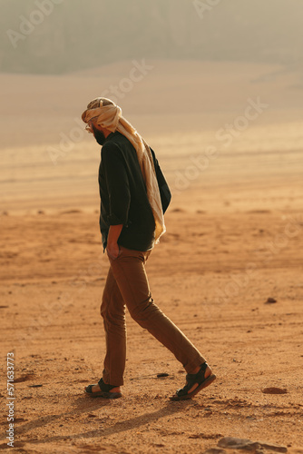 Man walking in the desert wadi rum