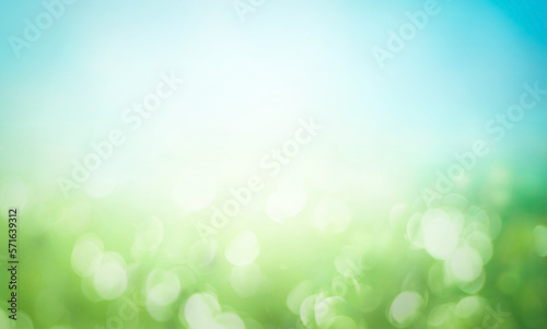 Abstract blur beautiful green nature and blue sky white clouds wallpaper background