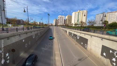 Cars driving onto an underground tunnel in Tanger, Morocco