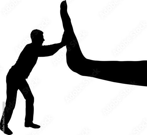 Silhouette of a man resists a big hand that wants to stop him. Business Concept