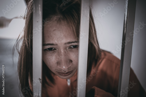 Hands of women desperate to catch the iron prison,prisoner concept,thailand people,Hope to be free,If the violate the law would be arrested and jailed.