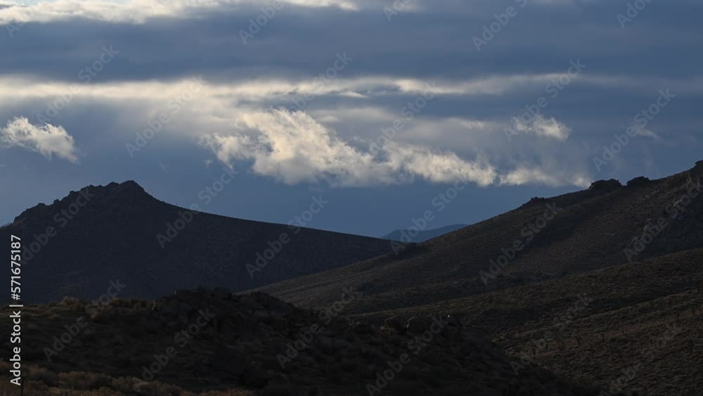 Fast moving early morning clouds Owens Peak area. Fast moving early morning clouds Owens Peak area.
