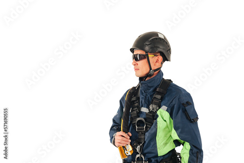 Portrait industrial mountaineer worker in uniform and sunglasses on white empty isolated background, looking away. Rope access laborer posing. Concept of industry urban works. Copy text space for ad