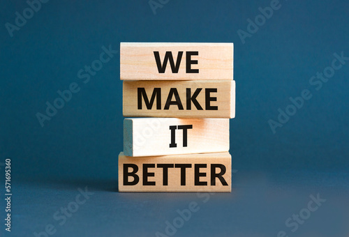 We make it better symbol. Concept words We make it better on wooden blocks. Beautiful grey table grey background. Business we make it better concept. Copy space.