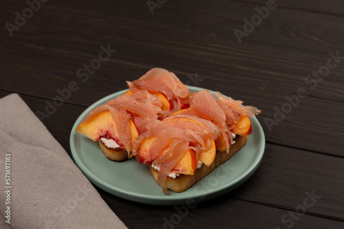 Toast with prosciutto and peach