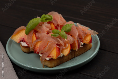 Toast with prosciutto and peach