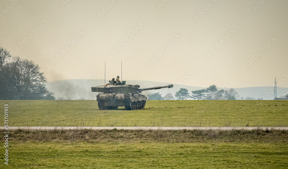 Fototapeta premium British army FV4034 Challenger 2 ii main battle tank in action, gun turret rotated to side, Wiltshire UK