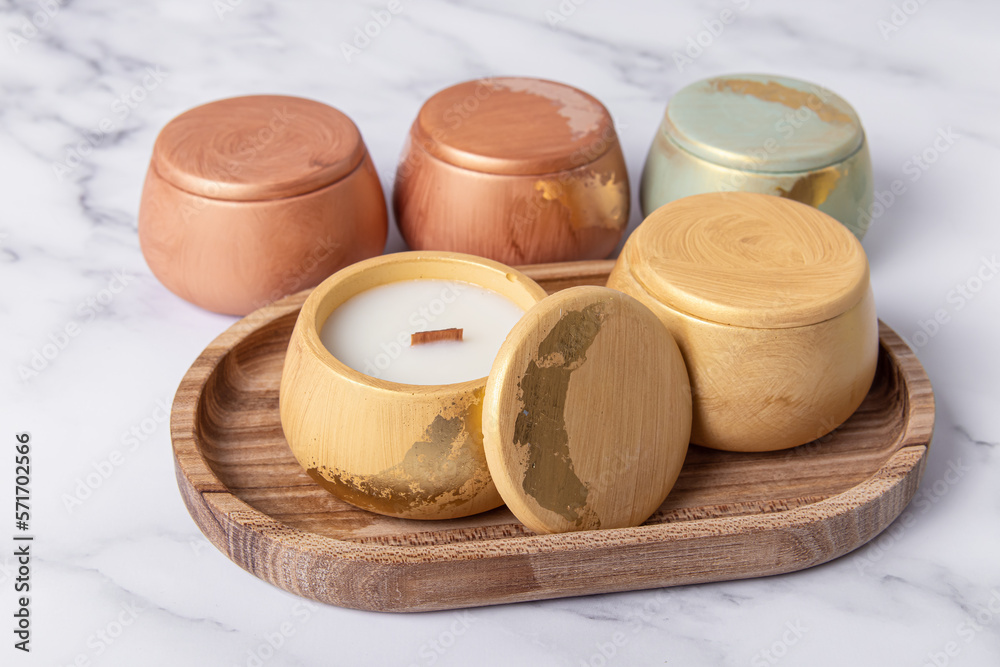 Assortment of candles. Candles in concrete cups with lids. Handmade Assortment of candles. Candles in concrete cups with lids. Handmade