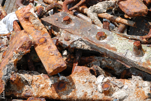 Pile of rusty old metal sheets and bolts - La Rochelle, France