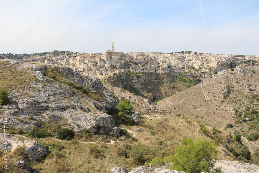 Hiking in Gravina di Matera gorge in summer, Italy