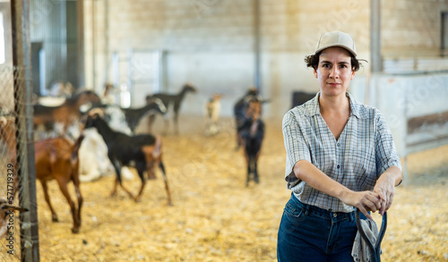 Portrait of confident latino woman owner of goat farm