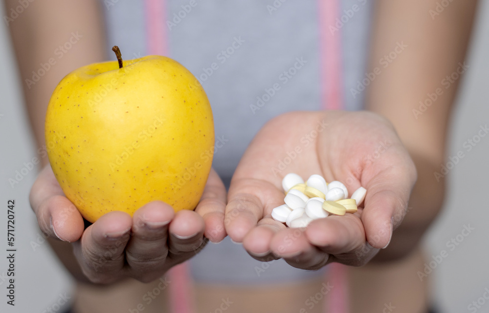 weight loss nutrition get slim fit concept.woman holding vacuum cup for massage measure tape centimeter and pills in palm isolated.recovery after childbirth young mother showing belly diet attractive weight loss nutrition get slim fit concept.woman holding vacuum cup for massage measure tape centimeter and pills in palm isolated.recovery after childbirth young mother showing belly diet attractive