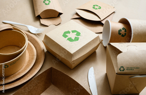 Biodegradable food packaging with recycling marks. Paper disposable environmentally friendly tableware for environmental protection