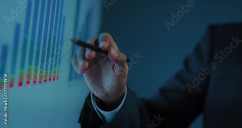 closeup view of hands of african businessman showing profit chart in business meeting, 4K, Prores