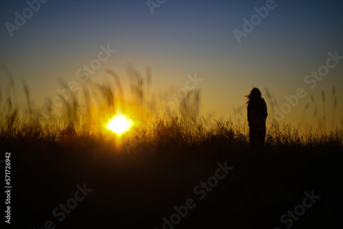 Fototapeta Naklejka Na Ścianę i Meble -  silhouette of a person in the sunset