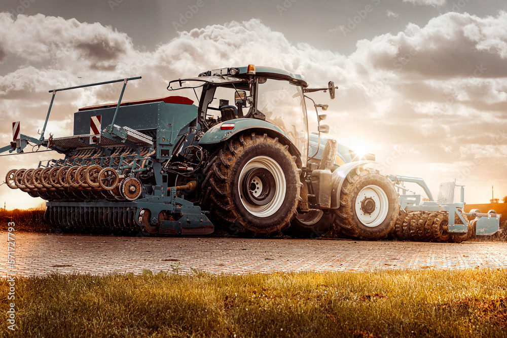 tractor for farmers on road in sunshine tractor for farmers on road in sunshine