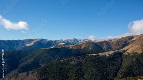 idyllic mountain landscape, with the peak covered with snow, early spring © Rafaila Gheorghita