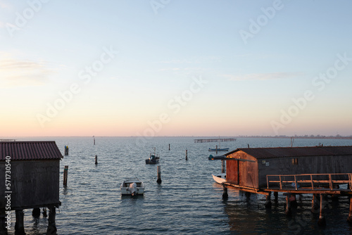 Fisherman's hut in delta del Po at sunset