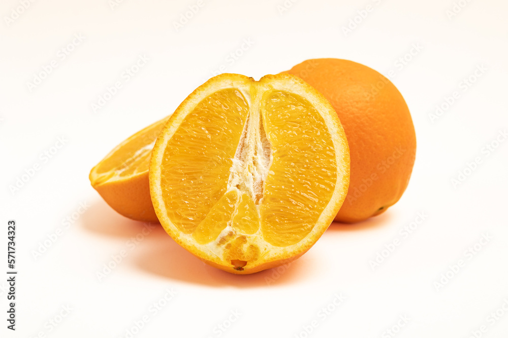 Fototapeta premium Sliced orange on a white background.