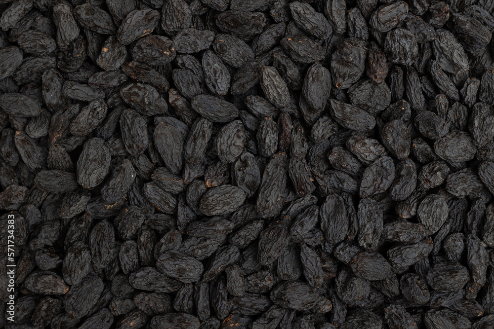 Blue raisins background. Raisin texture. Blue raisins background. Raisin texture.