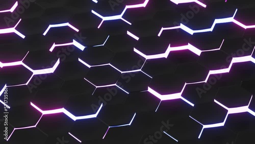 Seamless dark modern animation of hexagonal shapes moving up and down in black color from tilted axonometric view. Pink, orange and cyan colored backlight. Futuristic abstract background.
