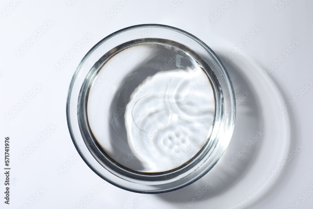 Glass bowl with water on white background, top view Glass bowl with water on white background, top view