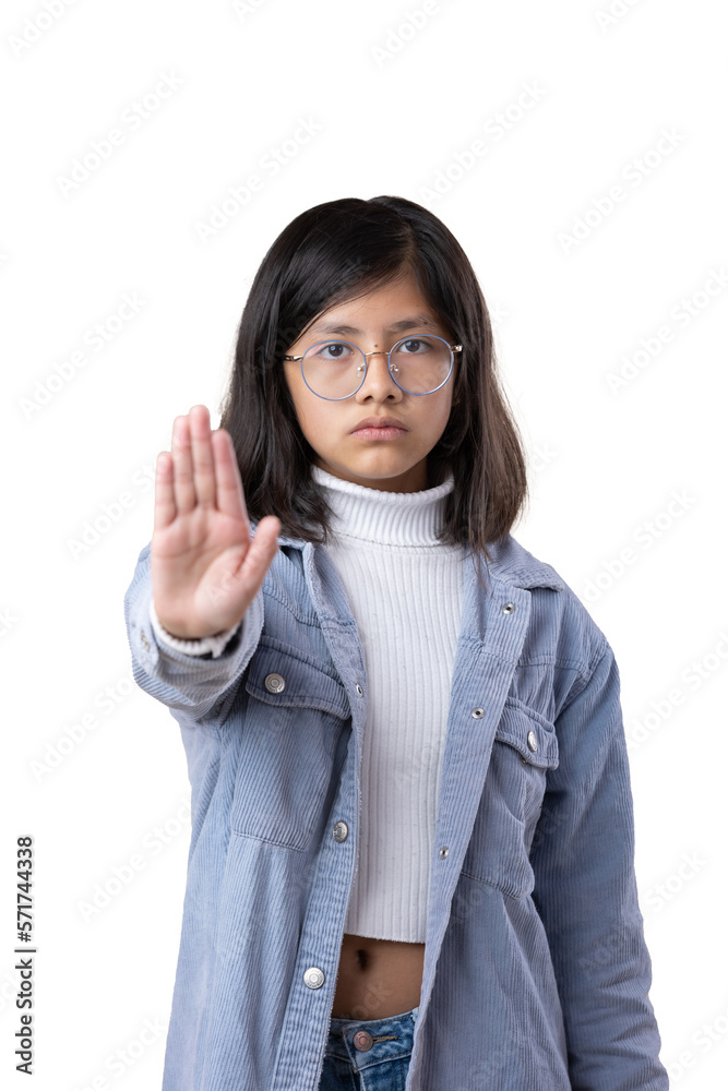 Mexican girl doing stop sign, woman's rights concept Mexican girl doing stop sign, woman's rights concept