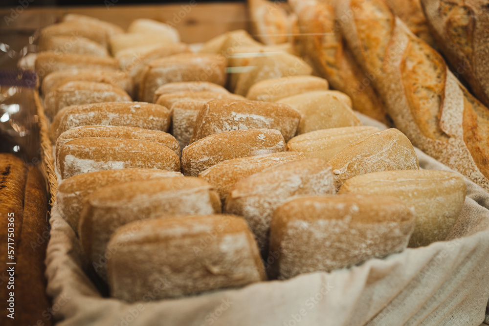 Shot of fresh glass breads in basket in artisan bakery