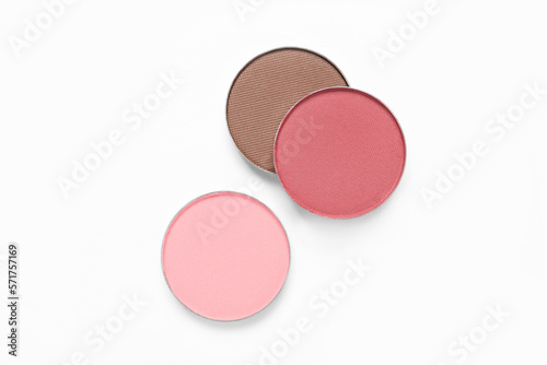 Different beautiful eye shadows on white background, flat lay