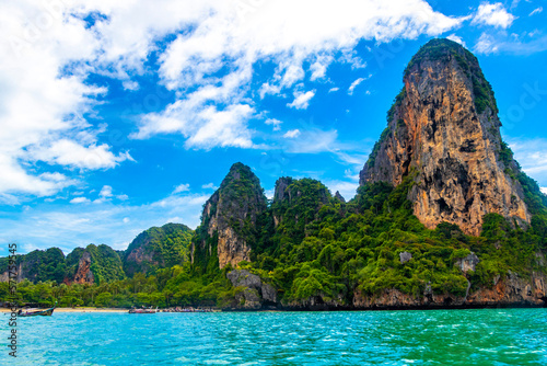 Tropical paradise turquoise water beach and  limestone rocks Krabi Thailand. © arkadijschell