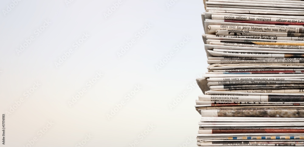 A pile of dusty, old magazines on background A pile of dusty, old magazines on background