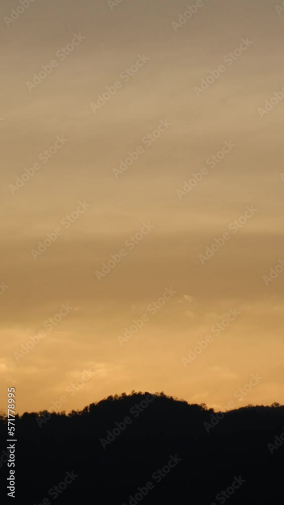 Twilight and dawn sky with cumulus cloud vertical time lapse in an evening. Twilight and dawn sky with cumulus cloud vertical time lapse in an evening.