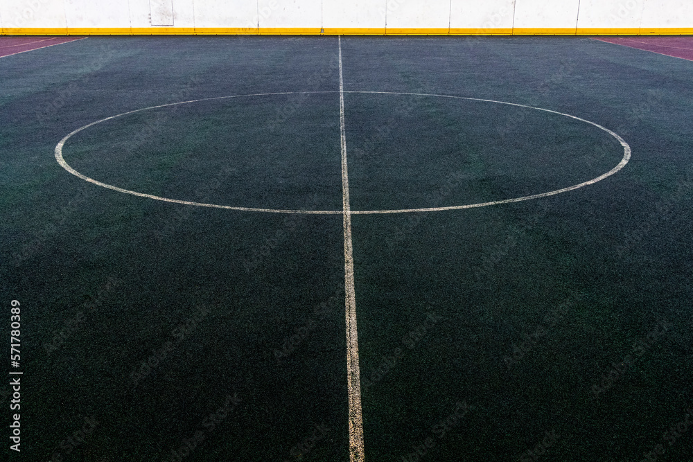 White dividing line of the sports field.